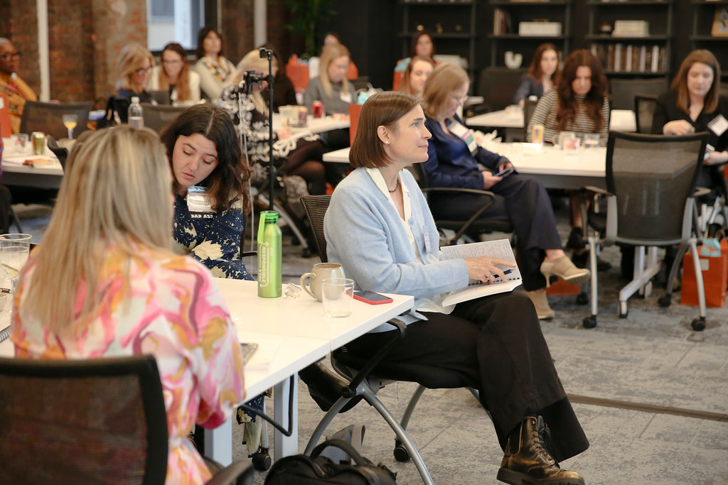 Members take notes during an FFiH session